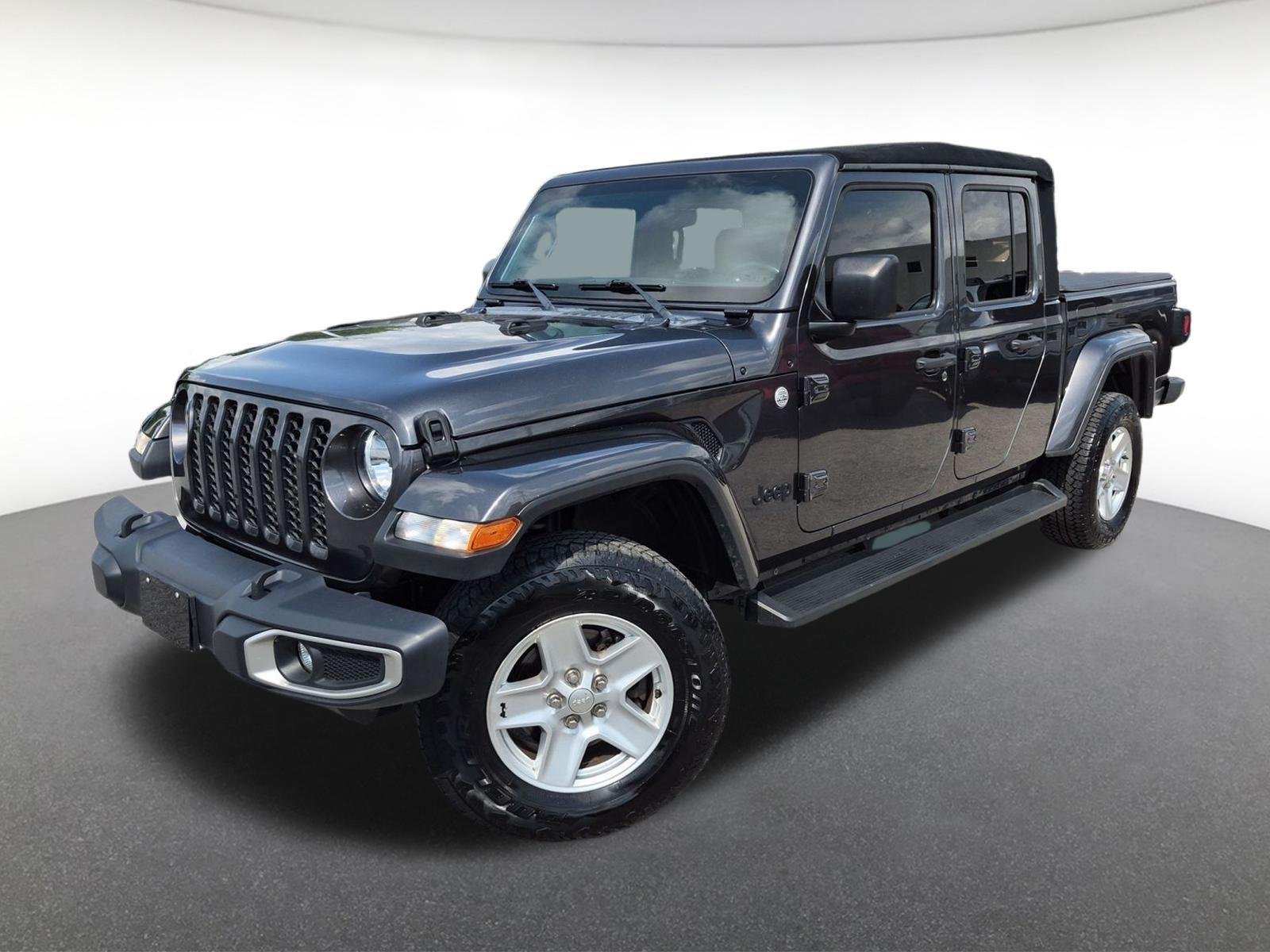 Used 2020 Granite Crystal Metallic Clearcoat Jeep Sport S image 1