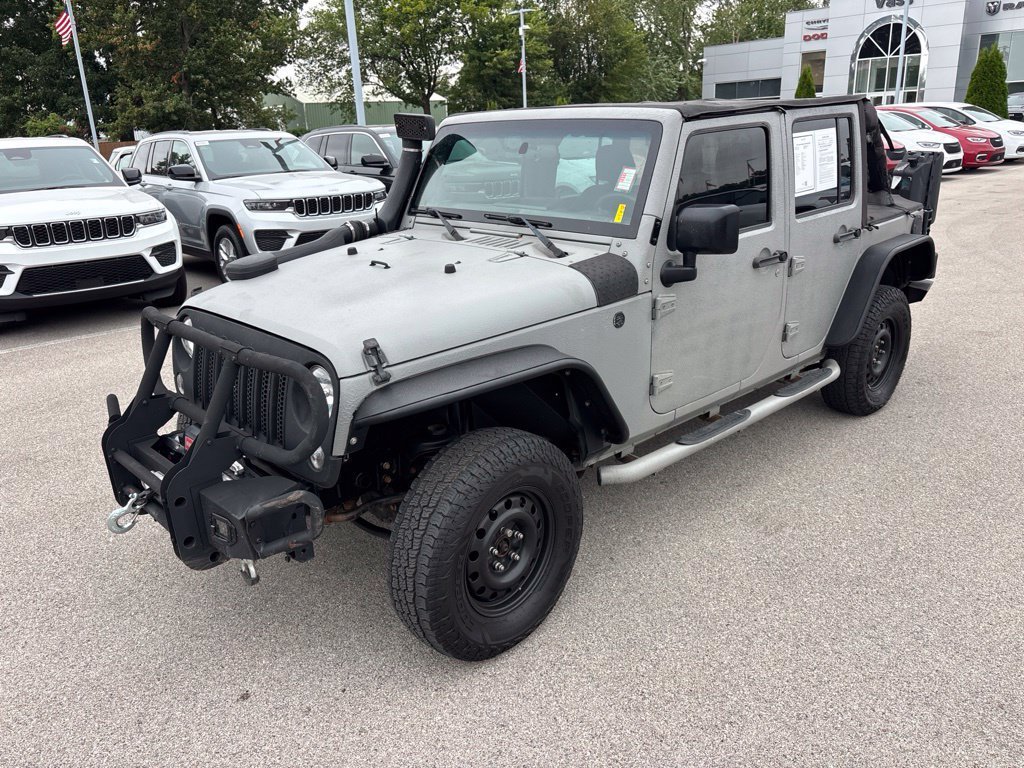 Certified Used 2016 Black Jeep Unlimited Sport image 1