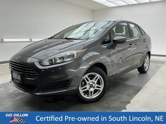 Used 2017 Magnetic Metallic Ford SE image 1