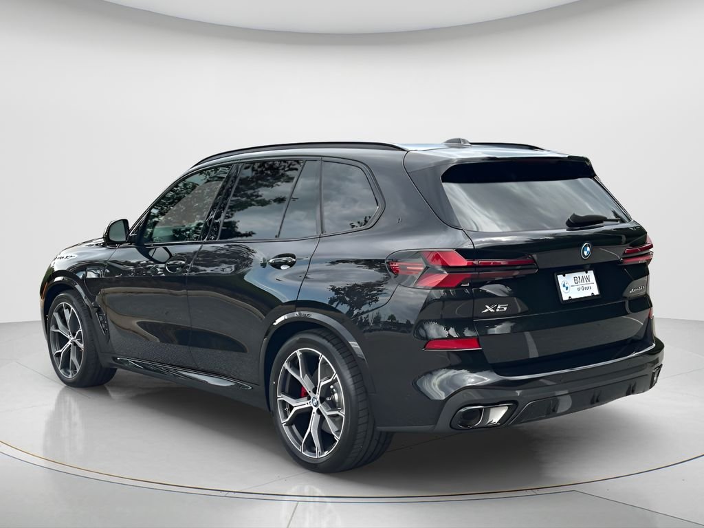 New 2026 Black Sapphire Metallic BMW xDrive50e image 7