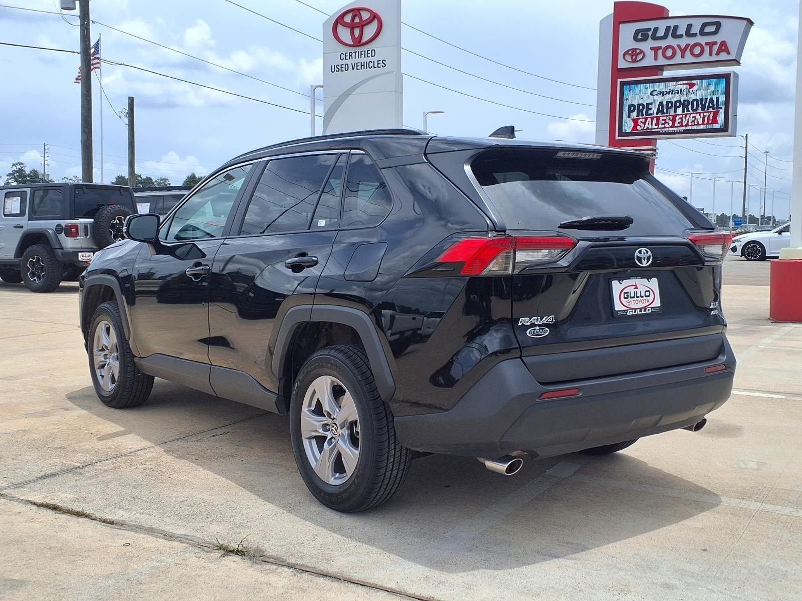 Certified Used 2025 Midnight Black Metallic Toyota XLE image 2