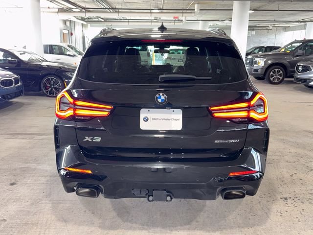 Used 2023 Black Sapphire Metallic BMW sDrive30i image 7