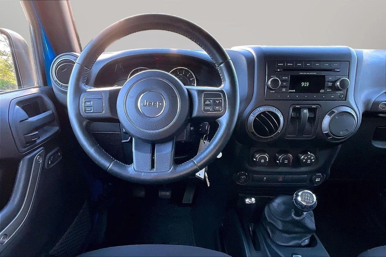 Certified Used 2016 Blue Jeep Sport image 11