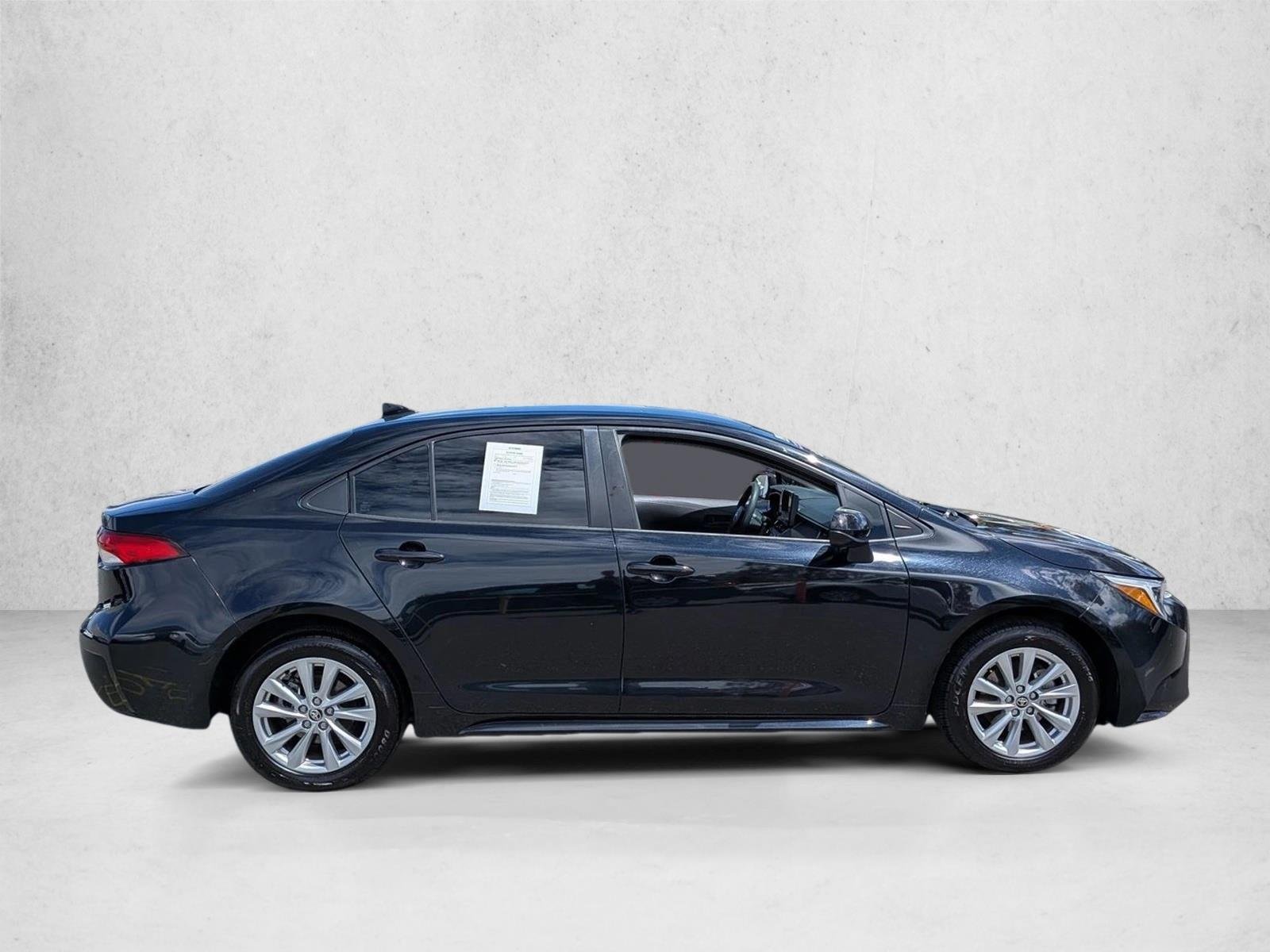Used 2024 Midnight Black Metallic Toyota Hybrid LE image 4