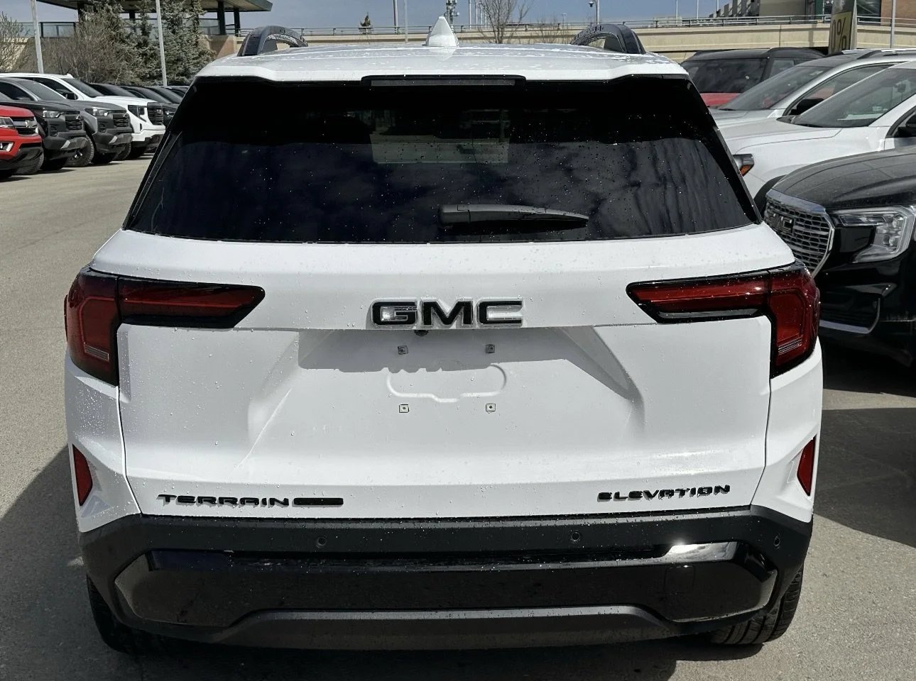 New 2026 Summit White GMC AWD Elevation image 5