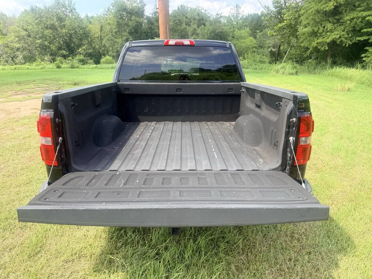 Used 2015 Black GMC SLT 4x2 4dr Crew Cab 5.8 ft. SB image 12