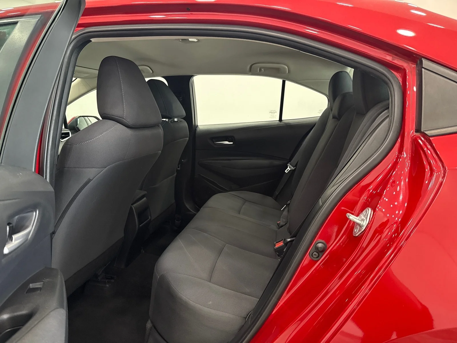 Used 2021 Barcelona Red Metallic Toyota LE image 33