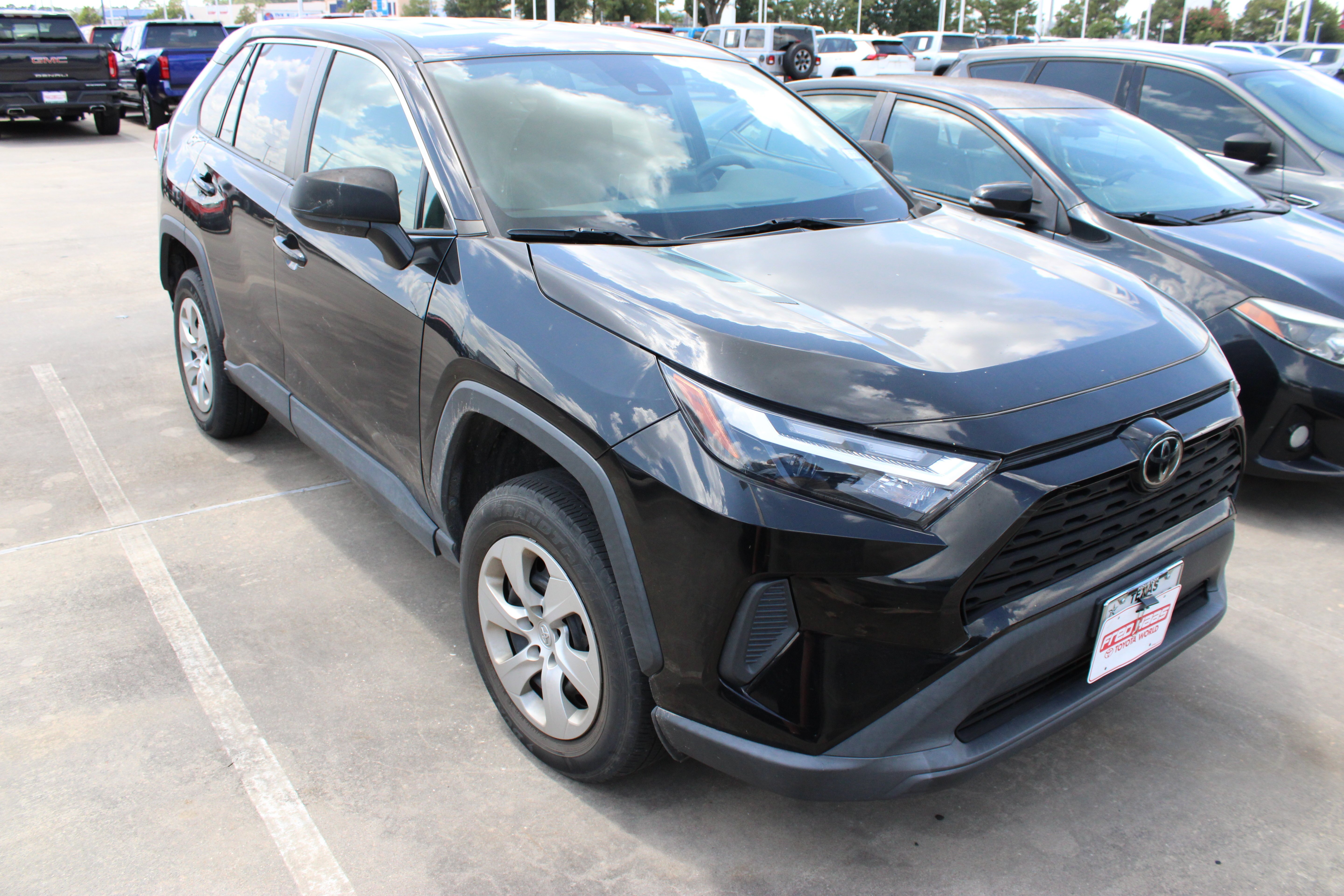 Used 2023 Midnight Black Metallic Toyota LE image 2