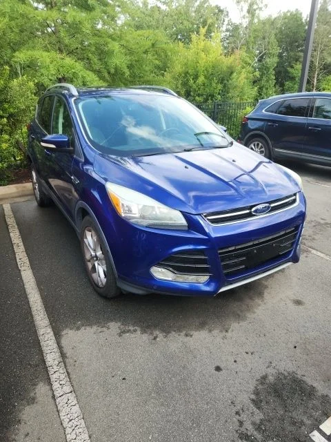 Used 2014 Blue Ford Titanium image 2