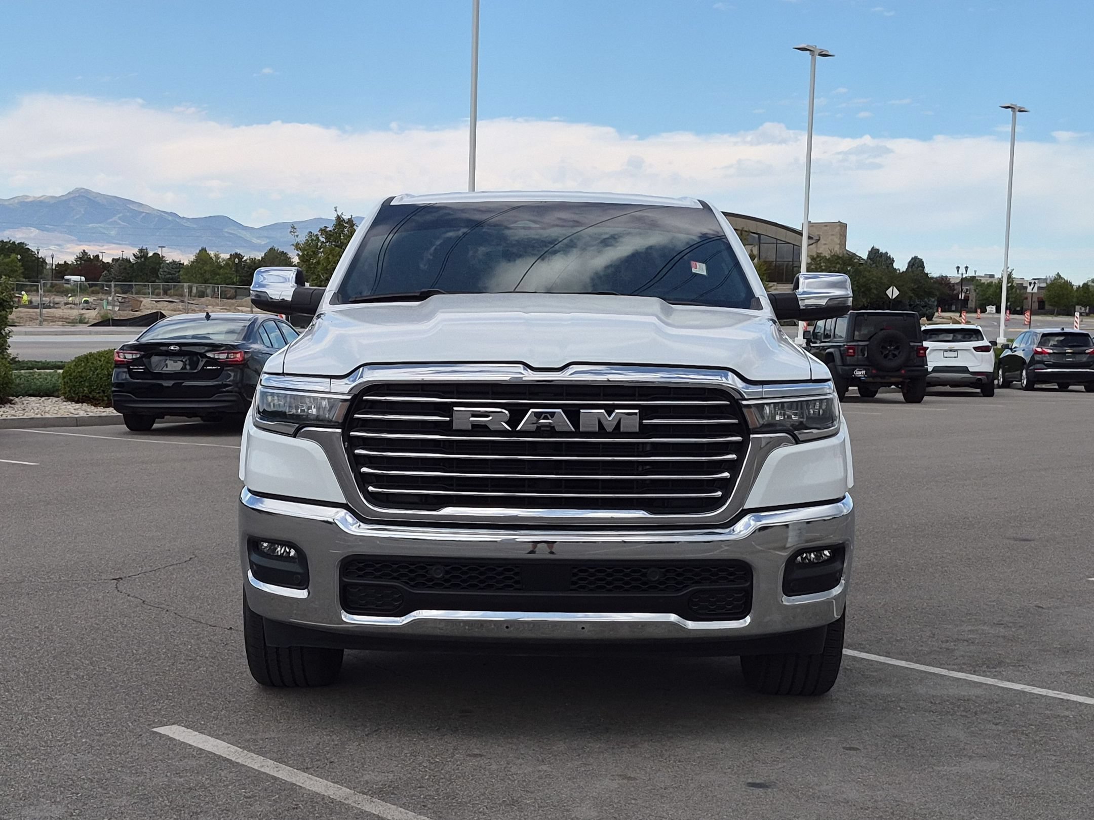 Used 2025 Bright White Clearcoat Ram Laramie image 9