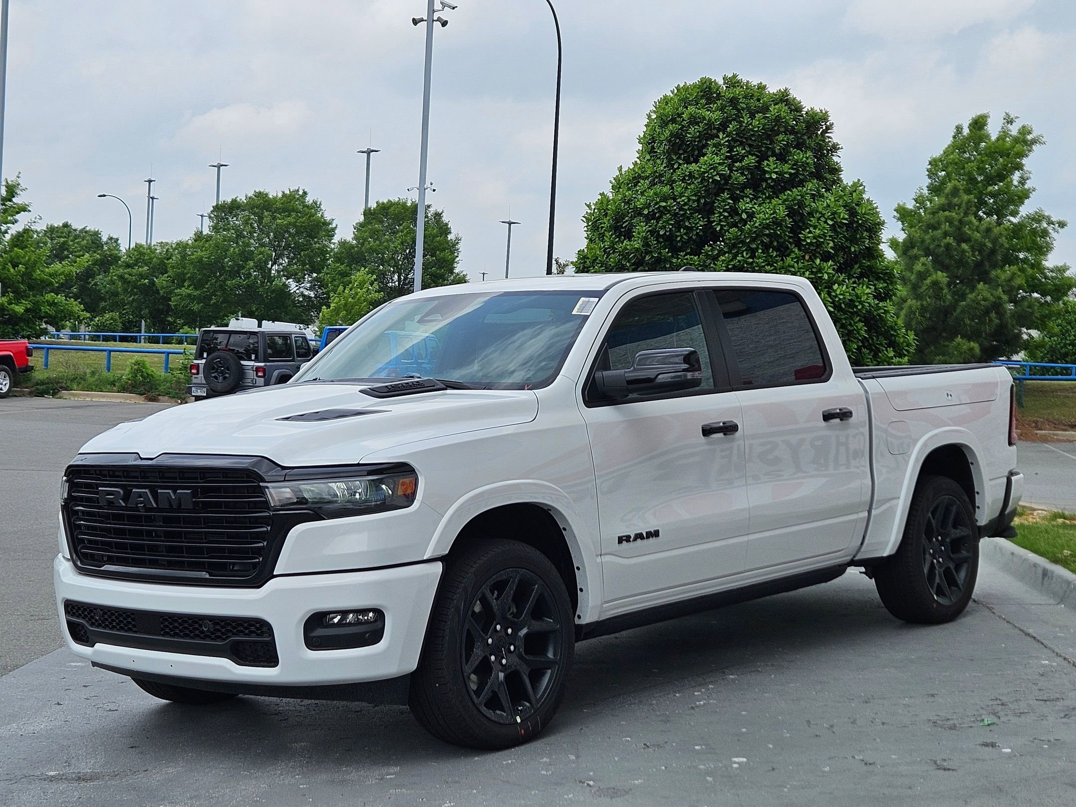 New 2026 Bright White Clear-Coat Exterior Paint RAM Laramie image 3