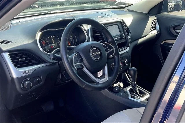 Used 2016 Blue Jeep Sport image 13