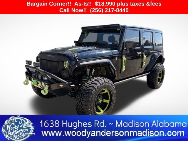 Used 2016 Black Clearcoat Jeep Unlimited Sport image 1