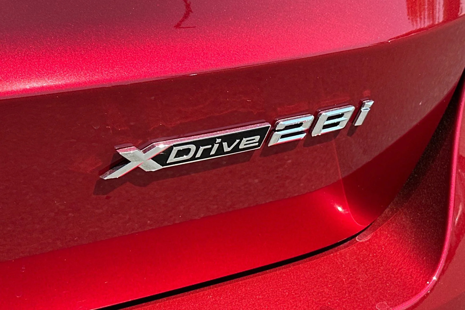 New 2026 Vegas Red Metallic BMW xDrive28i image 6