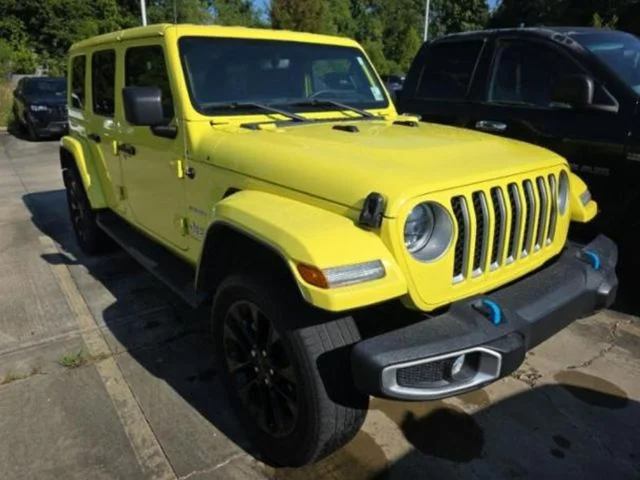Used 2023 Yellow Jeep Sahara 4xe image 1