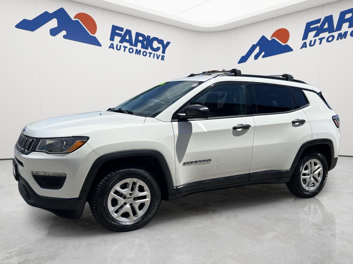 Used 2018 White Clearcoat Jeep Sport image 1