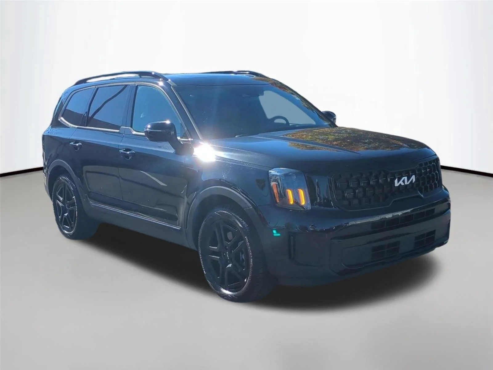 Used 2024 Ebony Black Kia EX X-Line image 7