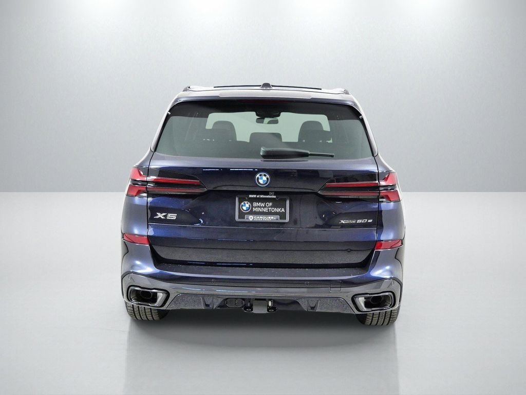 Used 2026 Carbon Black Metallic BMW xDrive50e image 11
