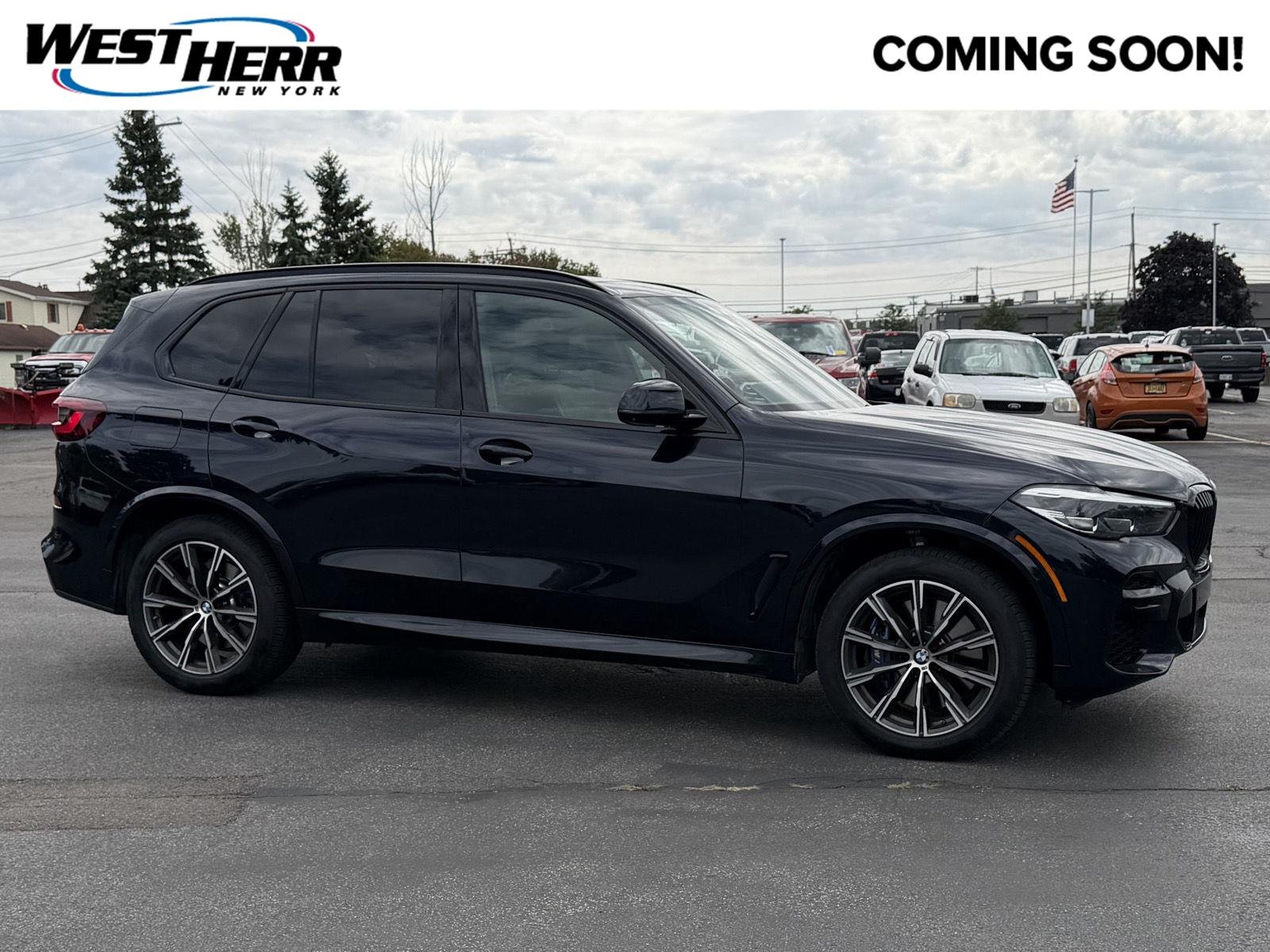 Used 2022 Carbon Black Metallic BMW M50i image 1