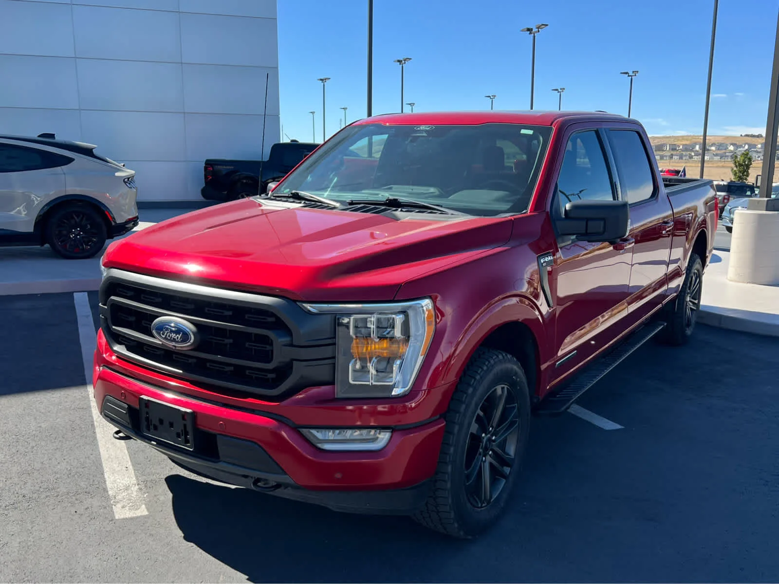 Certified Used 2022 Rapid Red Metallic Tinted Clearcoat Ford XLT image 2