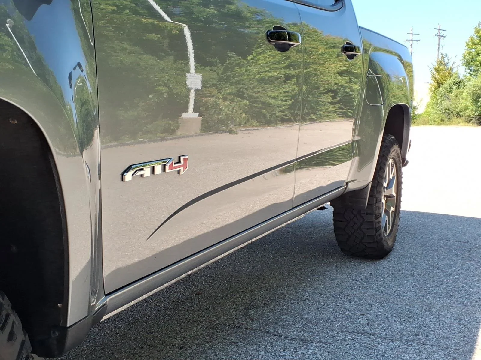 Used 2022 Satin Steel Metallic GMC 4WD AT4 with Leather image 34