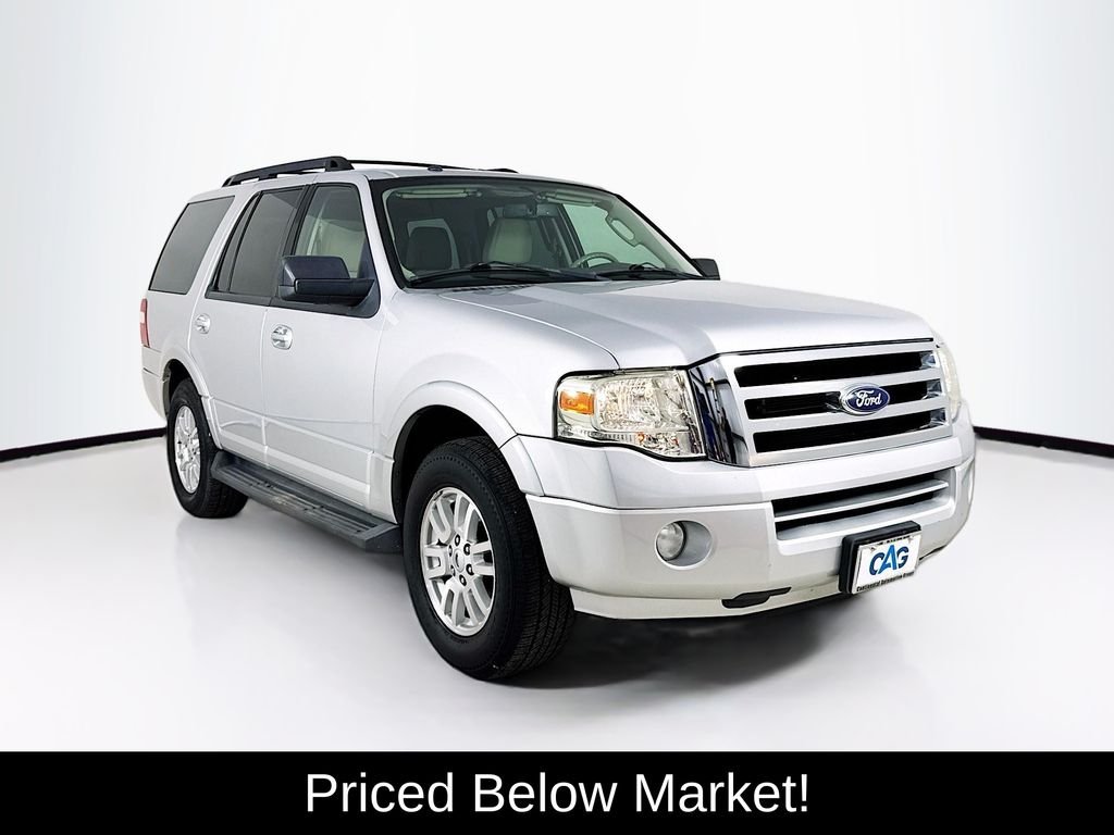 Used 2013 Ingot Silver Ford XLT image 1