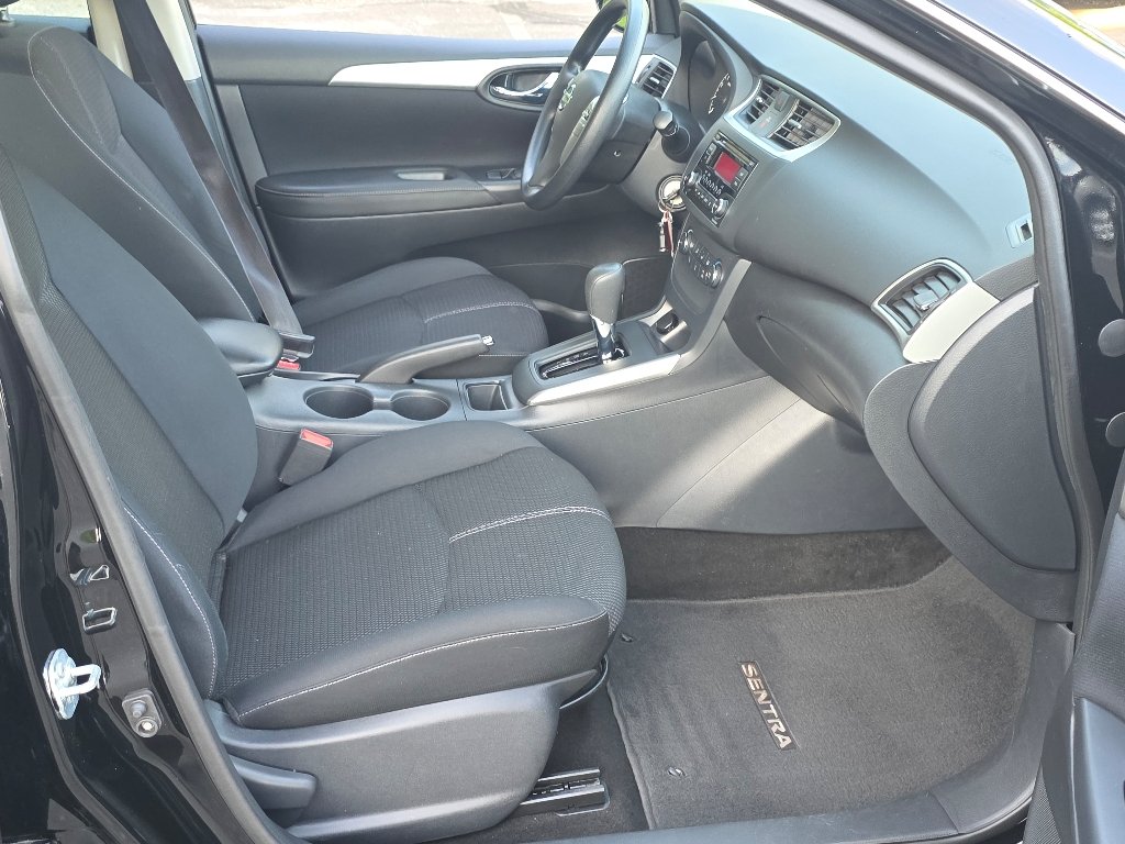 Used 2016 Super Black Nissan S image 17
