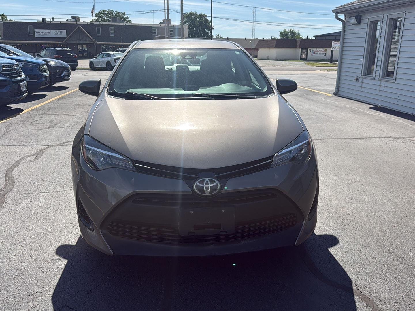 Used 2017 Toyota Corolla LE with VIN 5YFBURHE9HP640744 for sale in Washington, IL