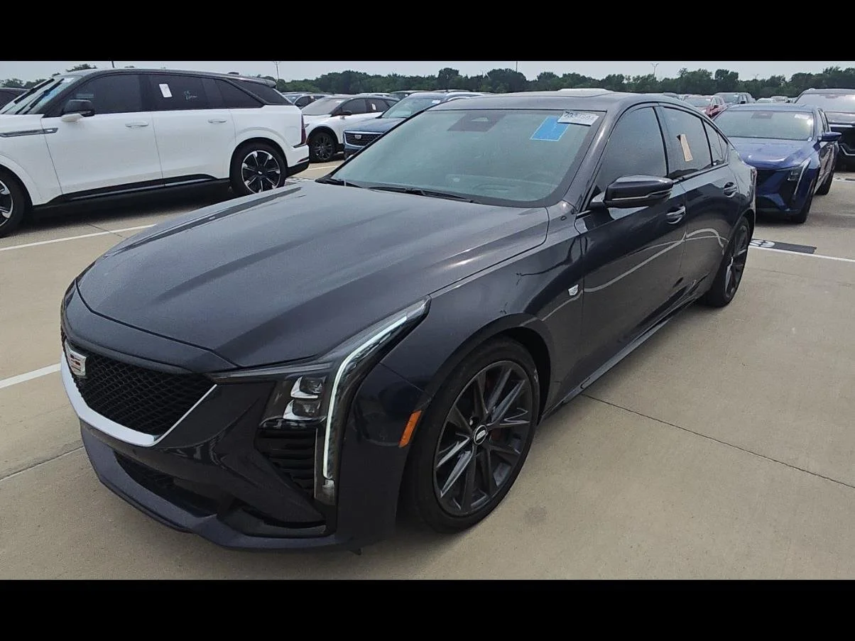 Used 2025 Midnight Sky Metallic Cadillac Sport image 1