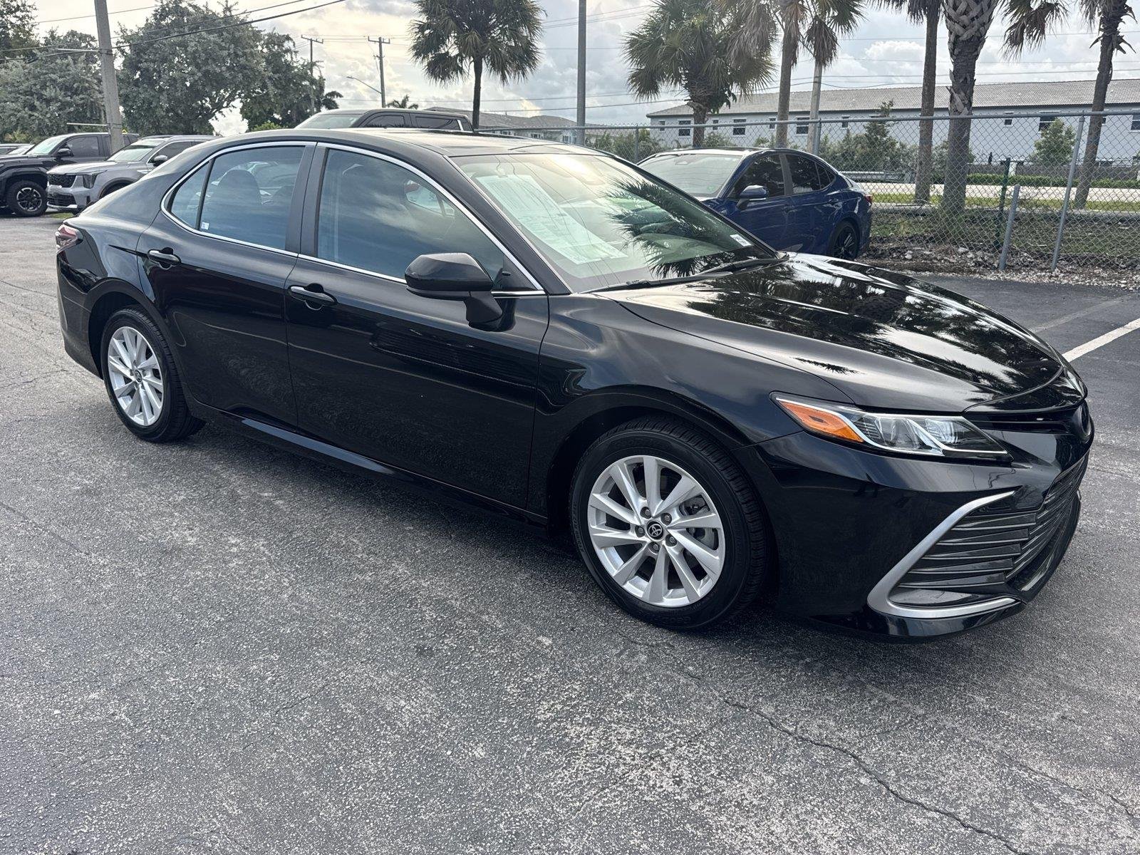 Used 2024 Midnight Black Metallic Toyota LE image 3