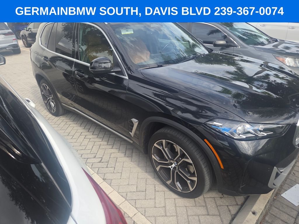 Certified Used 2024 Black Sapphire Metallic BMW sDrive40i image 14