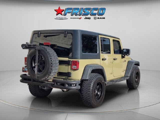 Used 2013 Green Jeep Unlimited Sport image 7