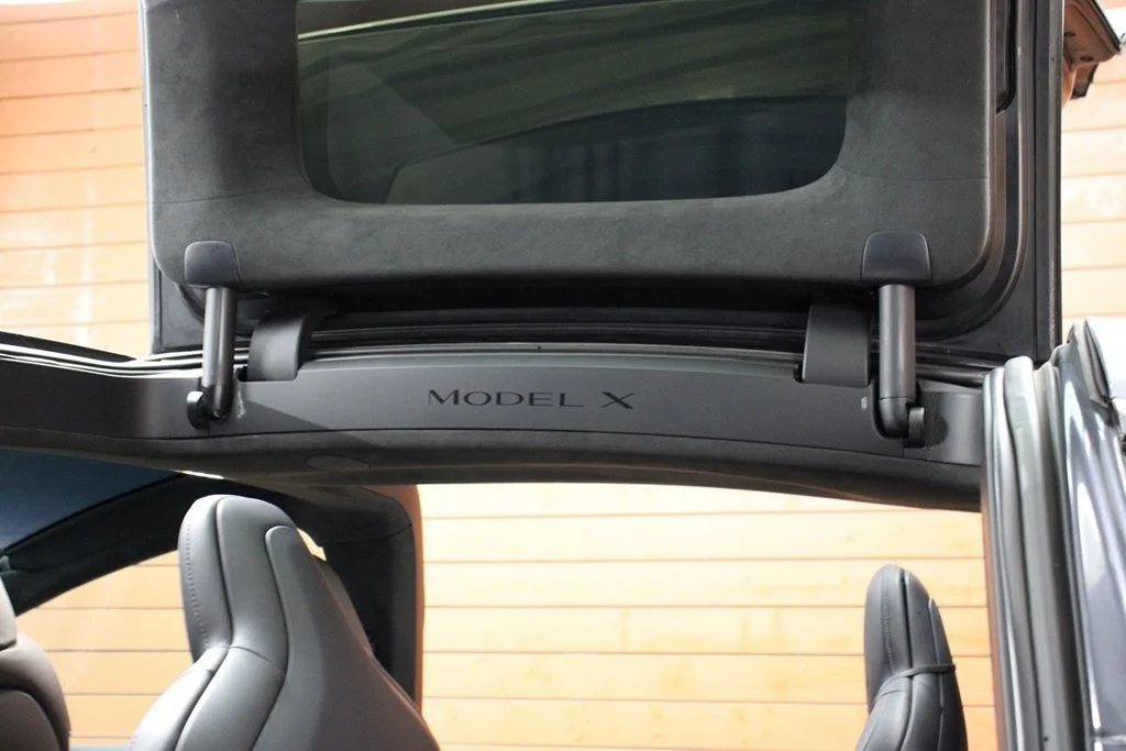 Used 2022 Solid Black Tesla Plaid image 18