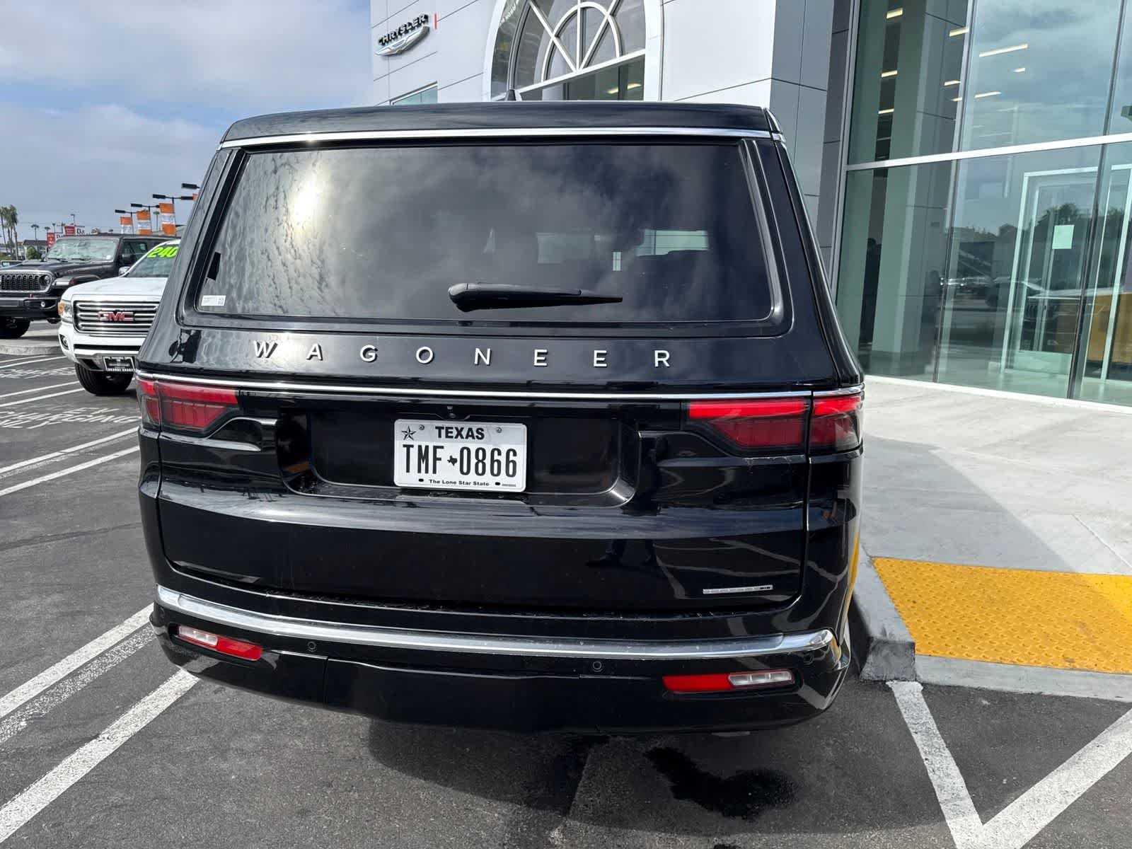 Used 2024 Diamond Black Crystal Pearlcoat Jeep Series II image 13