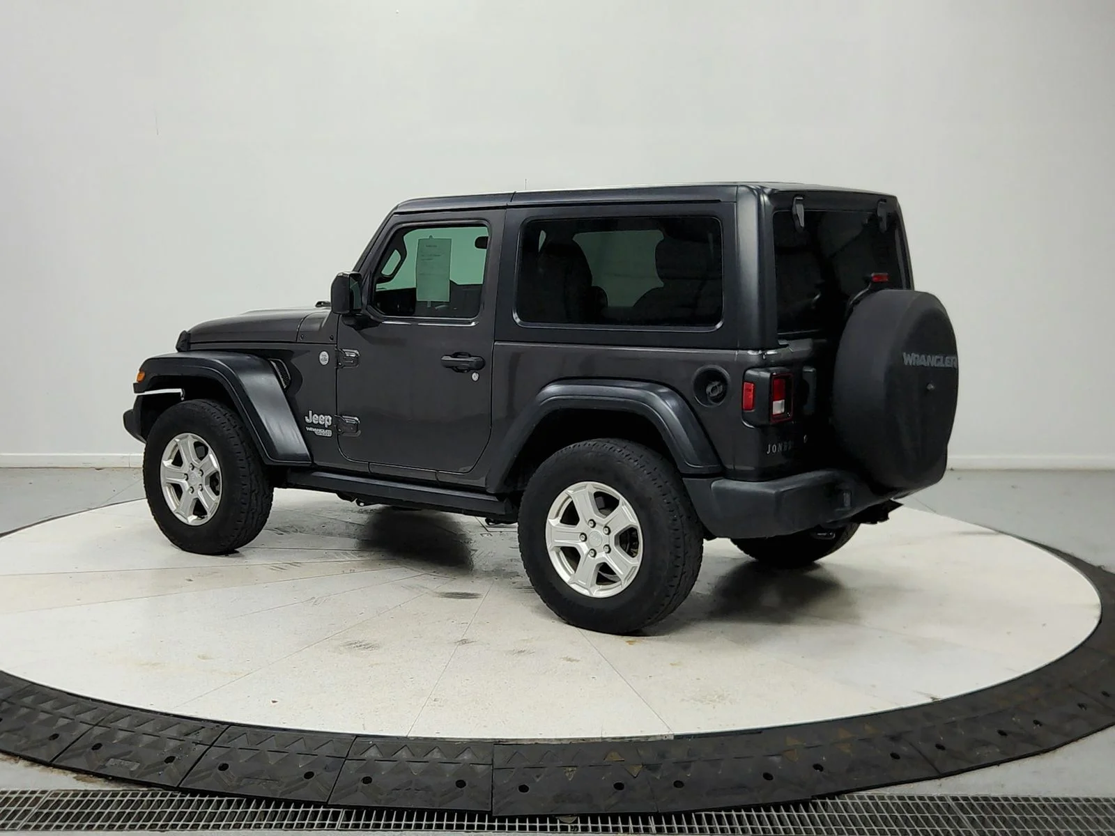 Used 2019 Granite Crystal Clearcoat Metallic Jeep Sport image 6