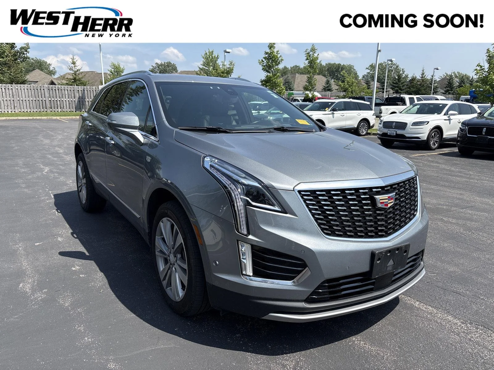 Used 2024 Argent Silver Metallic Cadillac AWD Premium Luxury image 1