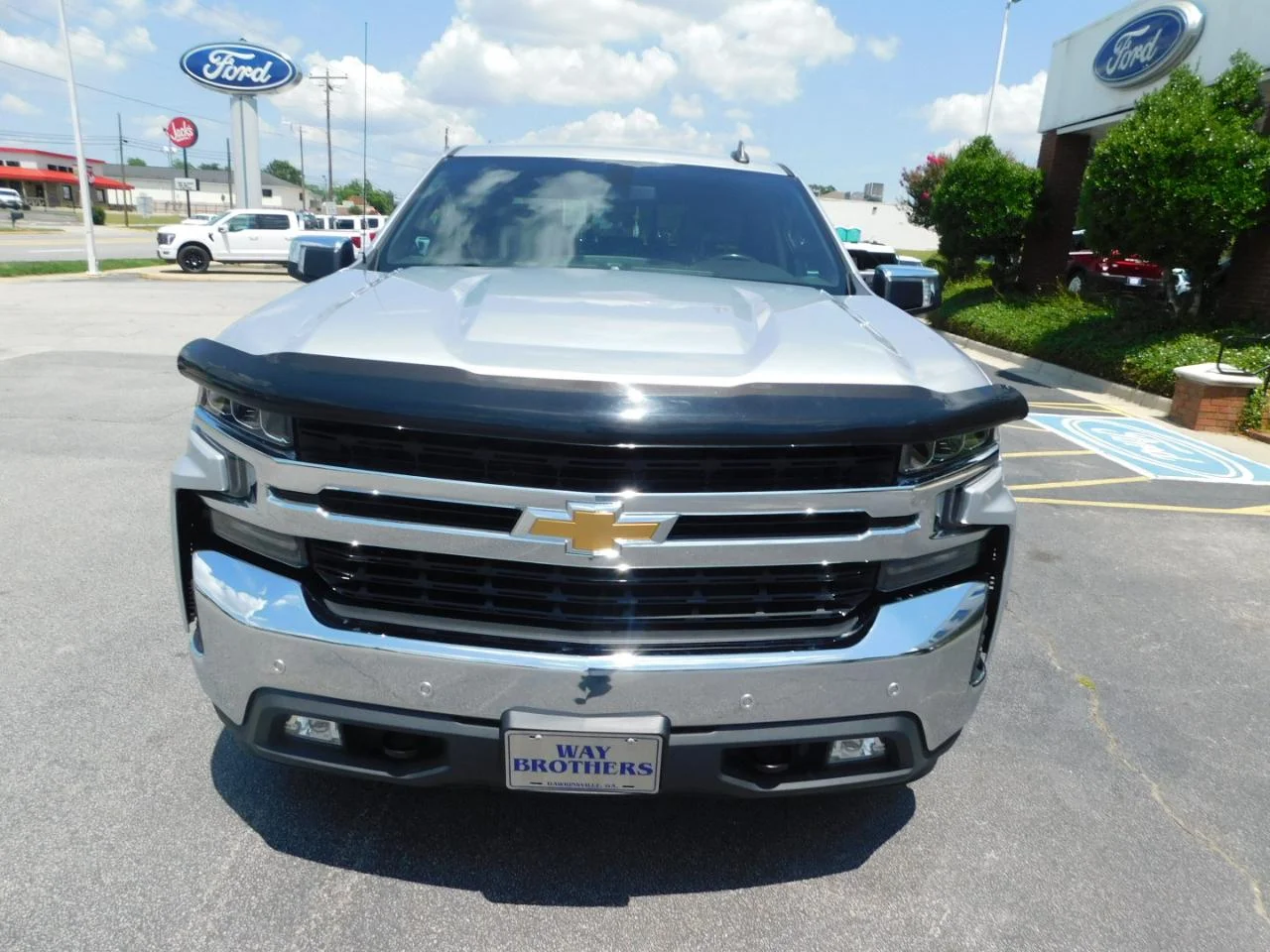 Used 2020 Silver Chevrolet 4WD CREW CAB 147 in LT image 3