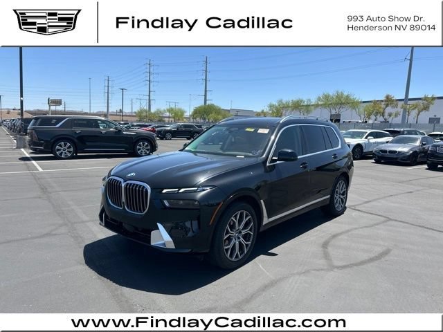 Used 2023 Black BMW xDrive40i image 1