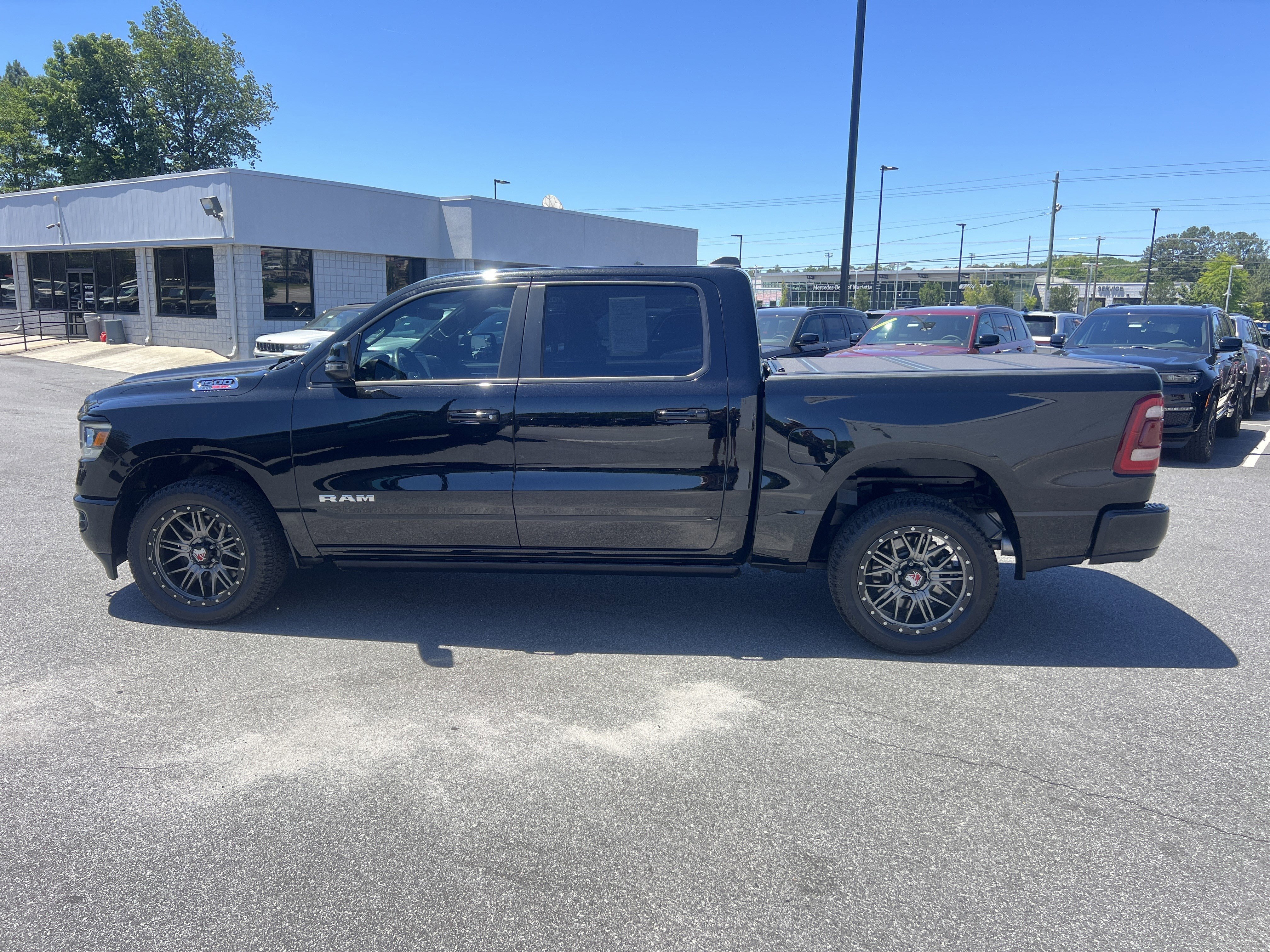 Used 2023 Diamond Black Crystal Pearlcoat Ram Laramie image 4