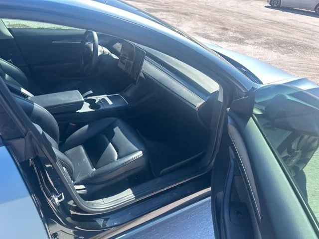 Used 2021 Solid Black Tesla Standard Range Plus image 9