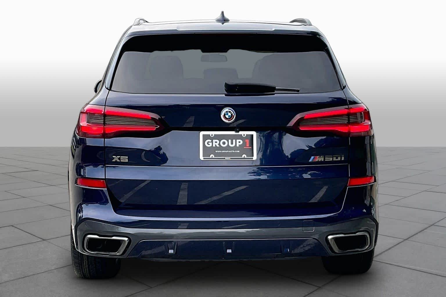 Used 2023 Tanzanite Blue II Metallic BMW M50i image 4