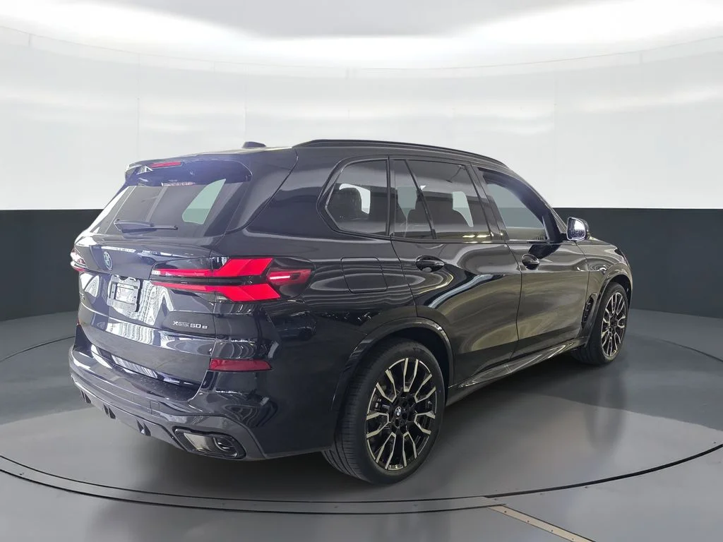 New 2026 Carbon Black Metallic BMW xDrive50e image 3