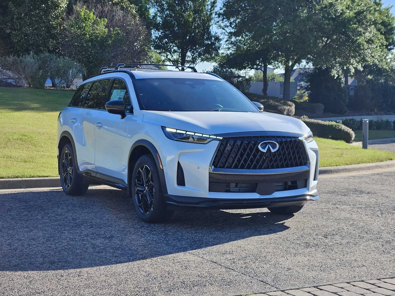 New 2026 RADIANT WHITE INFINITI Sport AWD image 2