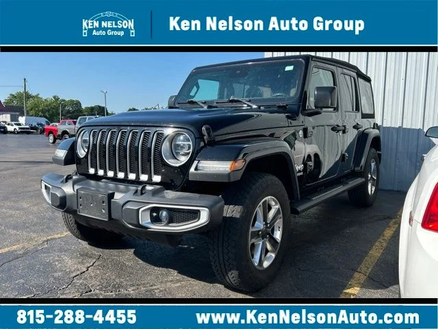 Used 2020 Black Jeep Unlimited Sahara image 1