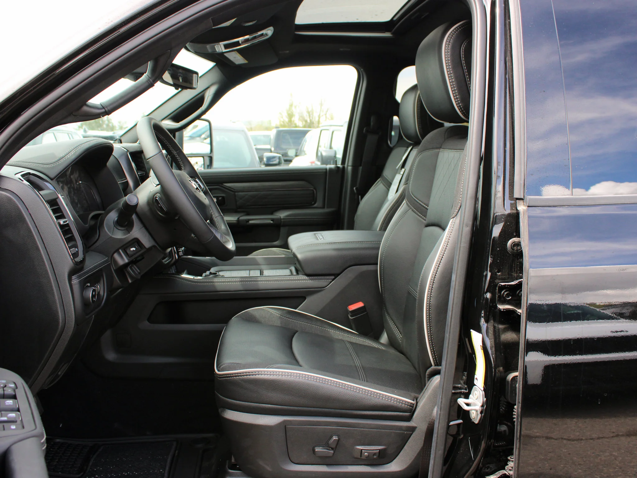 New 2026 Black RAM Limited* Mega Cab, 2 Inch Lift, 22 Inch American Force Wheels image 13