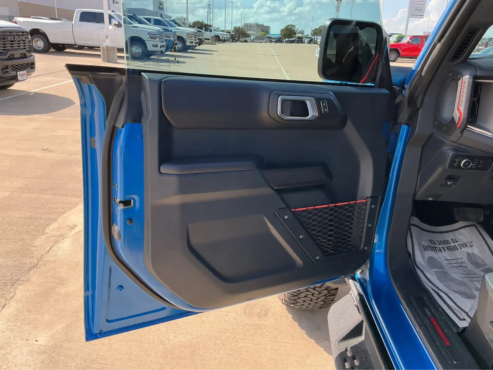 Used 2024 Velocity Blue Metallic Ford Raptor image 14