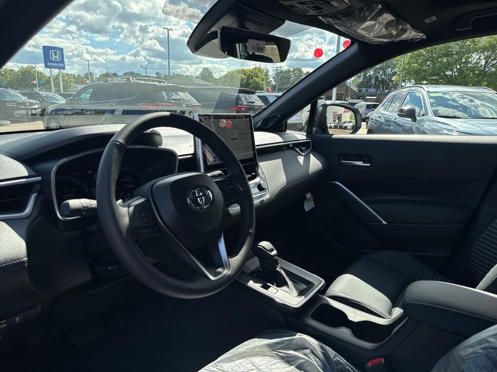 New 2026 Silver Toyota Hybrid XSE image 13