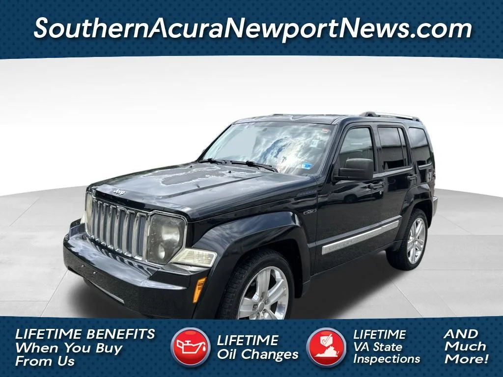 Used 2011 Black Jeep Sport image 1