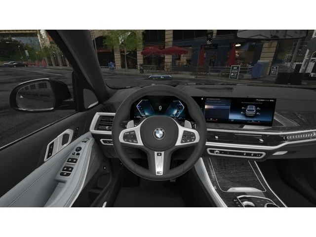 Used 2026 Black Sapphire Metallic BMW xDrive50e image 13