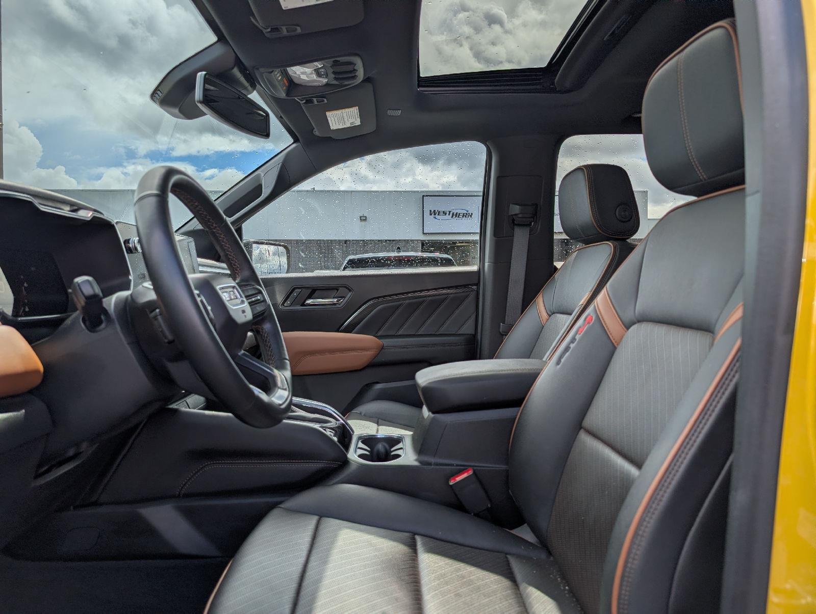 Used 2023 Solar Flare Metallic GMC 4WD AT4 image 11